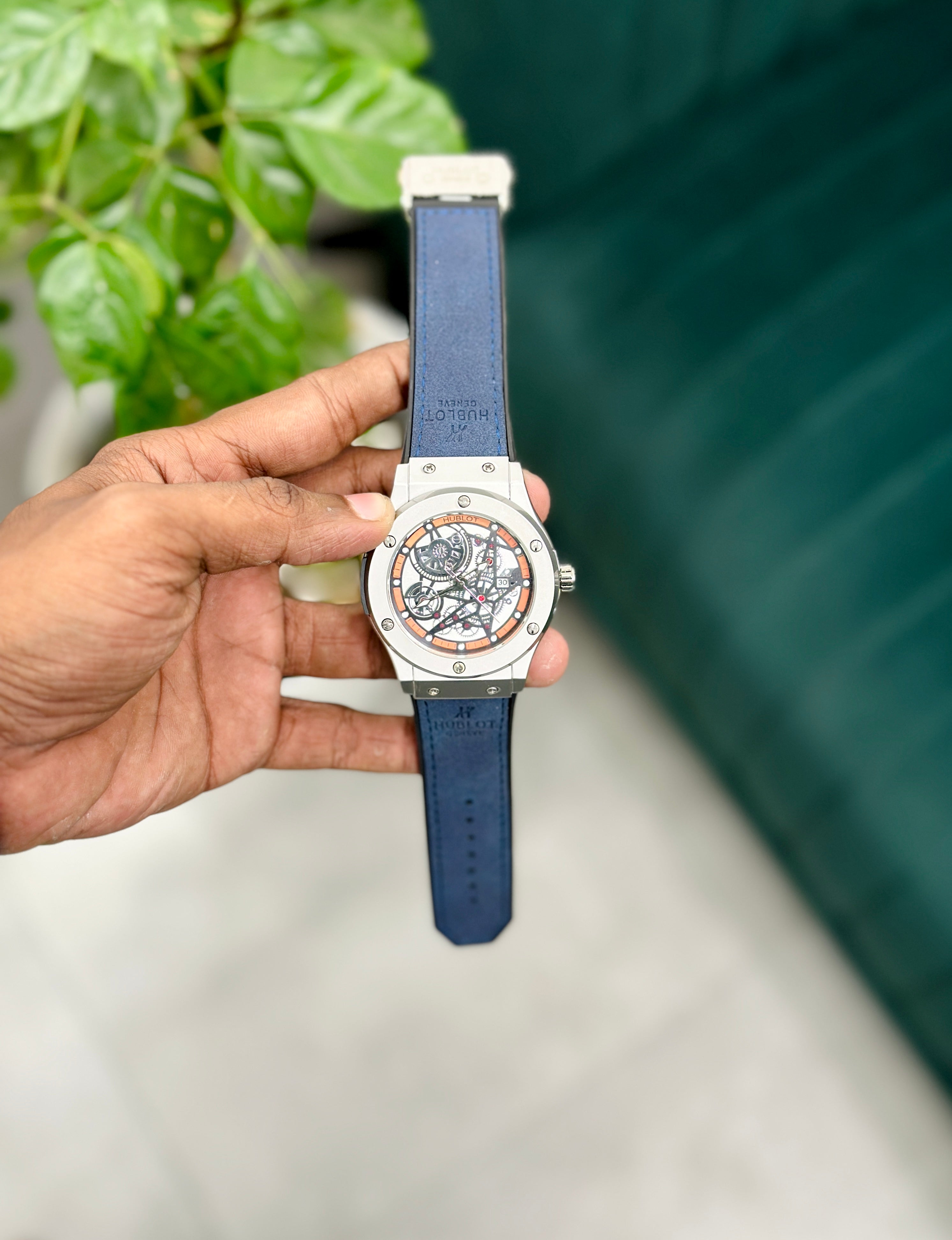  a blue wristwatch 