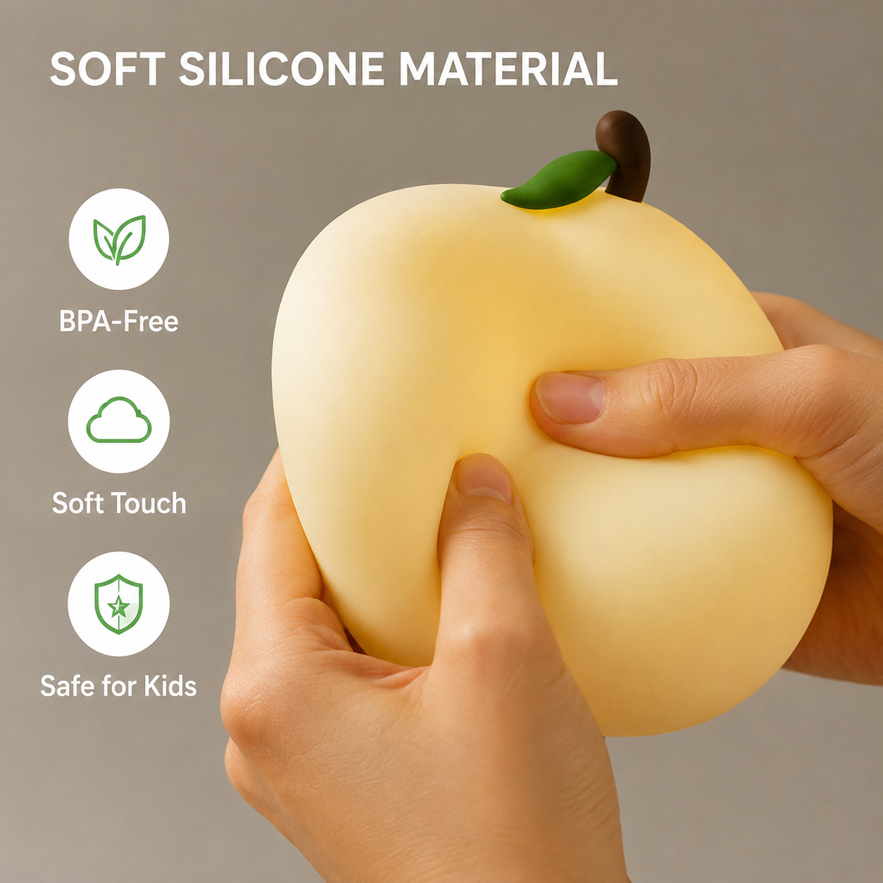 Hand holding a soft silicone pear-shaped toy with features listed on a gray background